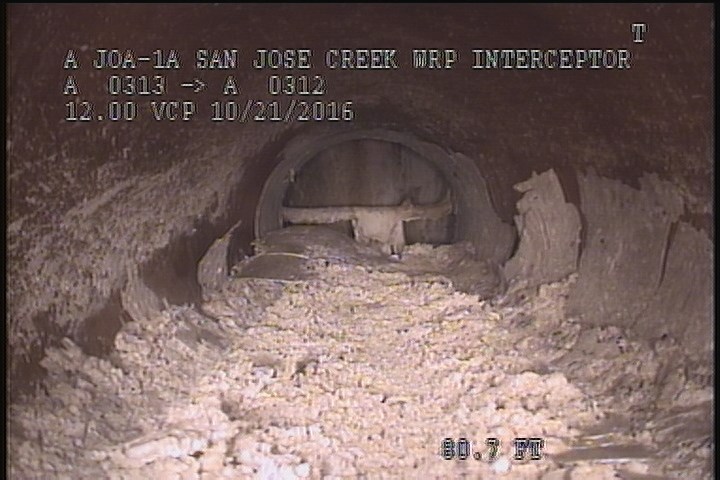 General Observation - 20% MAG COAT/DEBRIS @ THE BOTTOM OF THE PIPE, FINISH