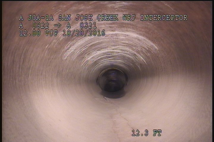 Upstream Manhole, Survey Begins - 9:55 AM