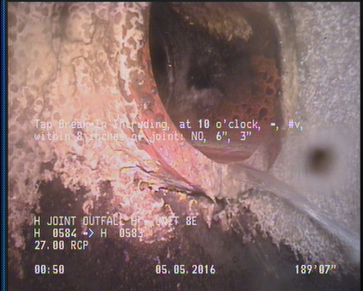 Tap Break-In Intruding, at 10 o'clock, -, #v, within 8 inches of joint: NO, 6", 3"