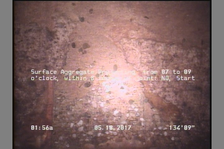 Surface Aggregate Projecting, from 07 to 09 o'clock, within 8 inches of joint: NO