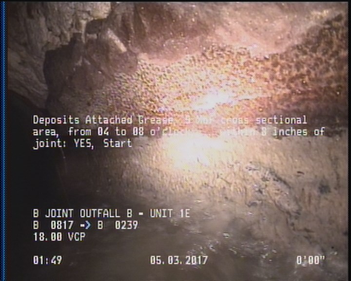 Deposits Attached Grease, 5 %of cross sectional area, from 04 to 08 o'clock, , within 8 inches of joint: YES