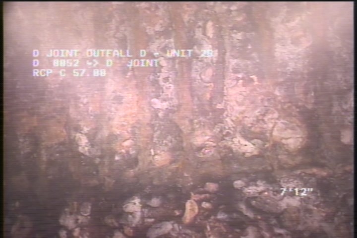 Surface Reinforcement Corroded, from 11 to 01 o'clock, within 8 inches of joint: YES - LONG & CIRCUM REBAR
