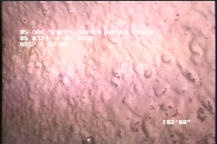 Surface Aggregate Projecting, from 07 to 05 o'clock, within 8 inches of joint: NO - SEVERE AGG UNDER MAG COAT