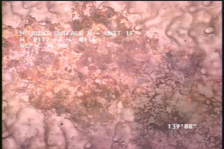 Surface Spalling, from 08 to 04 o'clock, within 8 inches of joint: NO - BLISTERING CONCRETE UNDER MAG COAT