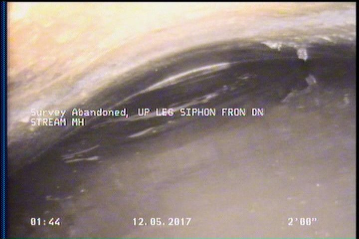 Survey Abandoned - UP LEG SIPHON FRON DN STREAM MH