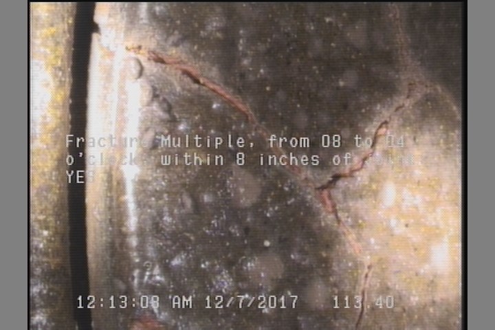Fracture Multiple, from 08 to 04 o'clock, within 8 inches of joint: YES