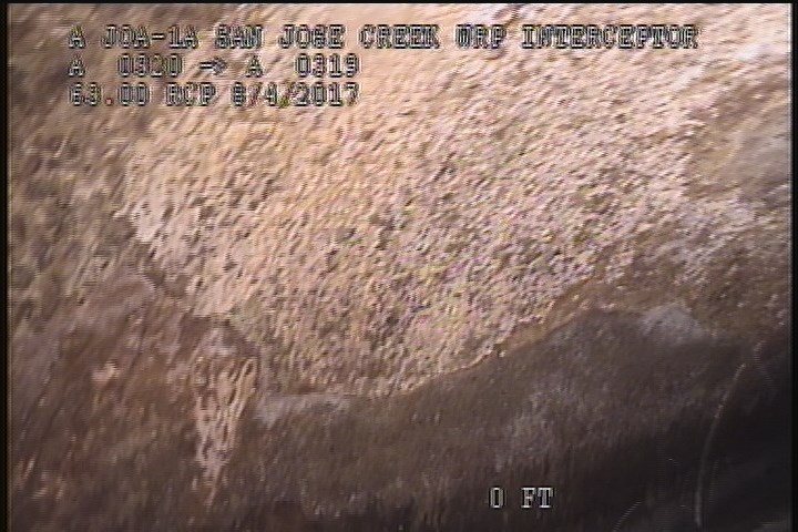 Surface Spalling, from 10 to 02 o'clock, within 8 inches of joint: YES - BLISTERING PEELING CONCRETE