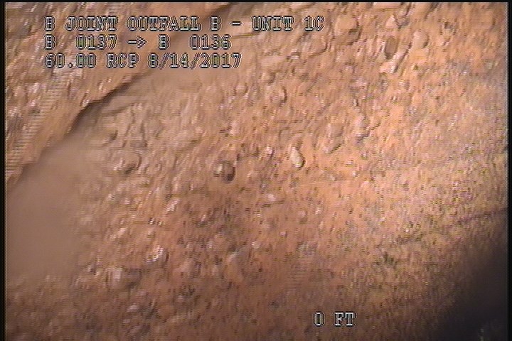 Surface Aggregate Projecting, from 10 to 02 o'clock, within 8 inches of joint: NO - SEVERE AGG