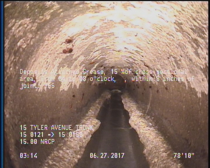Deposits Attached Grease, 15 %of cross sectional area, from 04 to 08 o'clock, , within 8 inches of joint: YES
