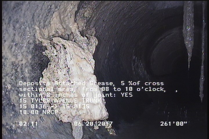 Deposits Attached Grease, 5 %of cross sectional area, from 08 to 10 o'clock, , within 8 inches of joint: YES