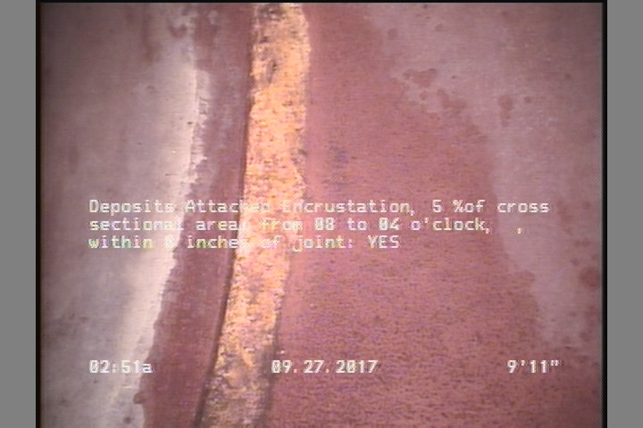 Deposits Attached Encrustation, 5 %of cross sectional area, from 08 to 04 o'clock, , within 8 inches of joint: YES