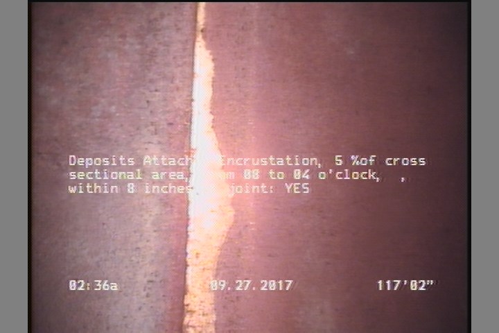Deposits Attached Encrustation, 5 %of cross sectional area, from 08 to 04 o'clock, , within 8 inches of joint: YES