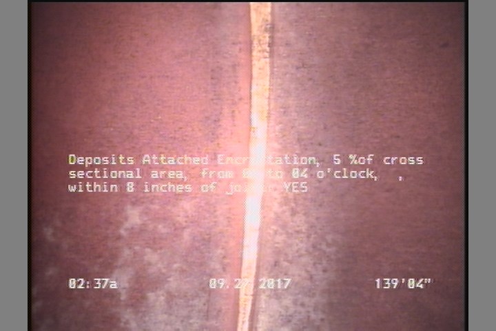 Deposits Attached Encrustation, 5 %of cross sectional area, from 08 to 04 o'clock, , within 8 inches of joint: YES