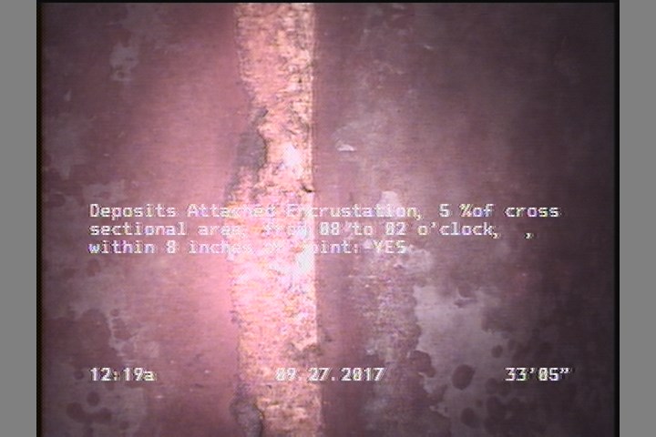 Deposits Attached Encrustation, 5 %of cross sectional area, from 08 to 02 o'clock, , within 8 inches of joint: YES