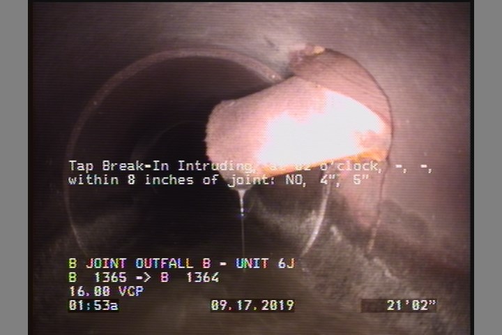 Tap Break-In Intruding, at 02 o'clock, -, -, within 8 inches of joint: NO, 4", 5" - LINER