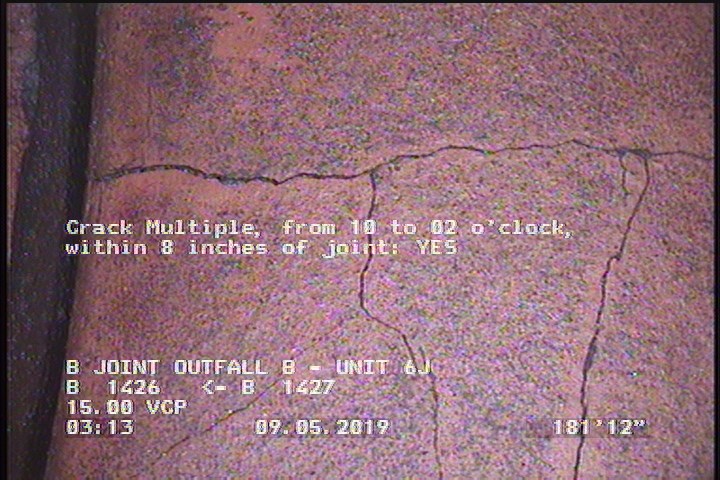 Crack Multiple, from 10 to 02 o'clock, within 8 inches of joint: YES
