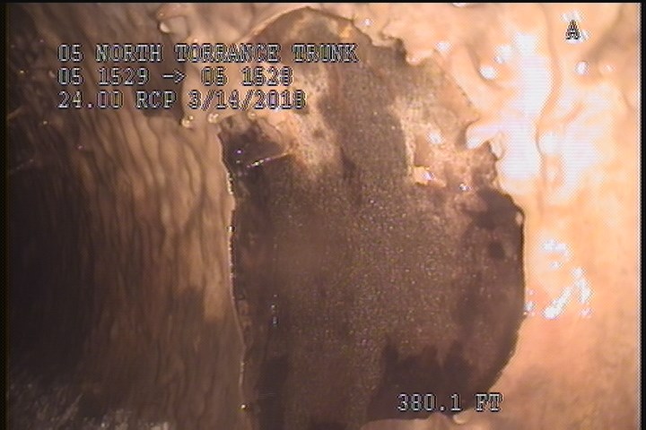 Surface Spalling, from 01 to 02 o'clock, within 8 inches of joint: NO - PEELING OF THE MAG COAT