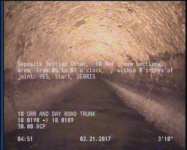 Deposits Settled Other, 10 %of cross sectional area, from 05 to 07 o'clock, , within 8 inches of joint: YES, Start - DEBRIS