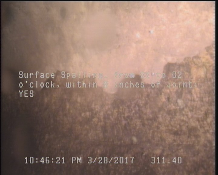 Surface Spalling, from 01 to 02 o'clock, within 8 inches of joint: YES