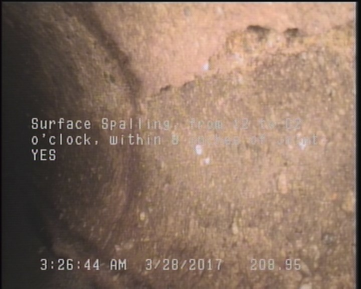 Surface Spalling, from 12 to 02 o'clock, within 8 inches of joint: YES