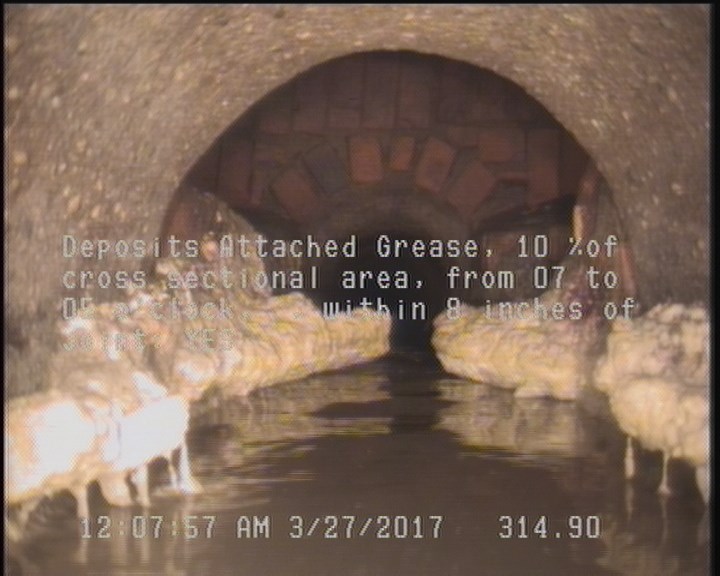 Deposits Attached Grease, 10 %of cross sectional area, from 07 to 05 o'clock, , within 8 inches of joint: YES