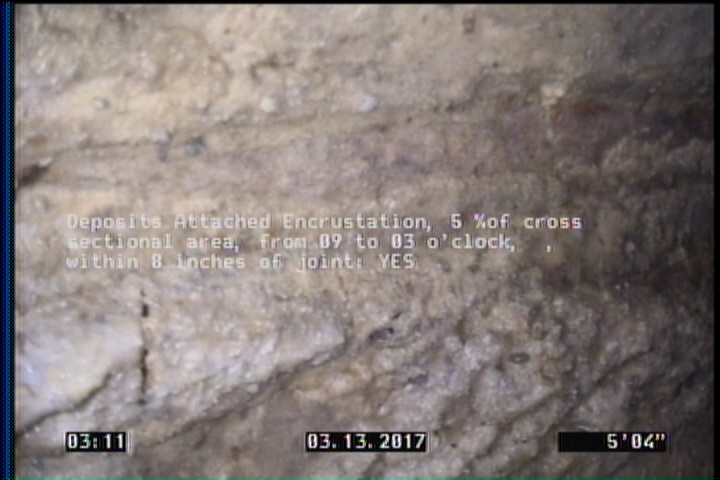 Deposits Attached Encrustation, 5 %of cross sectional area, from 09 to 03 o'clock, , within 8 inches of joint: YES