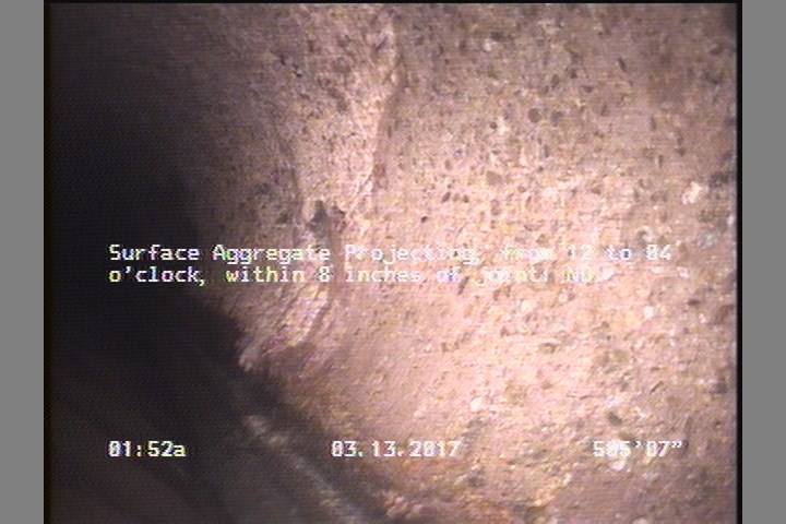 Surface Aggregate Projecting, from 12 to 04 o'clock, within 8 inches of joint: NO