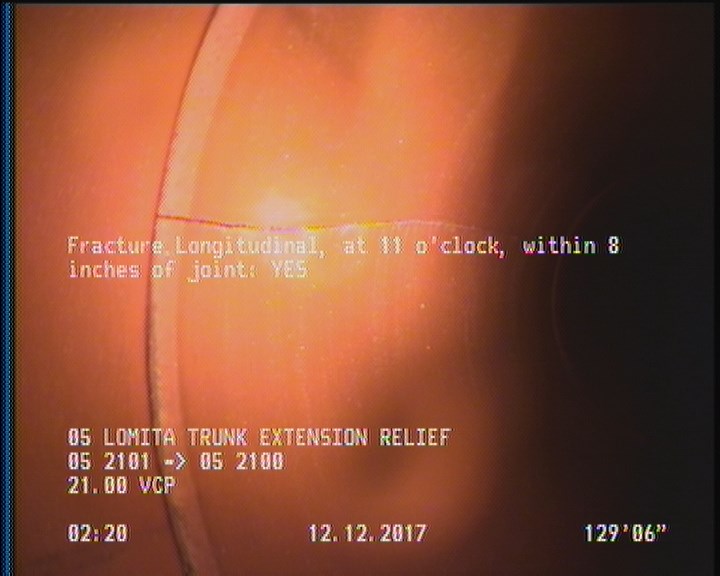 Fracture Longitudinal, at 11 o'clock, within 8 inches of joint: YES