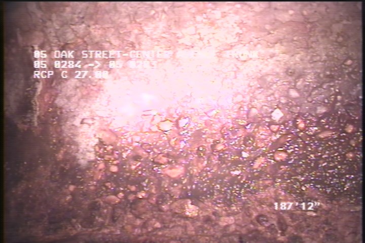 Surface Aggregate Projecting, from 08 to 04 o'clock, within 8 inches of joint: YES - SEVERE AGG