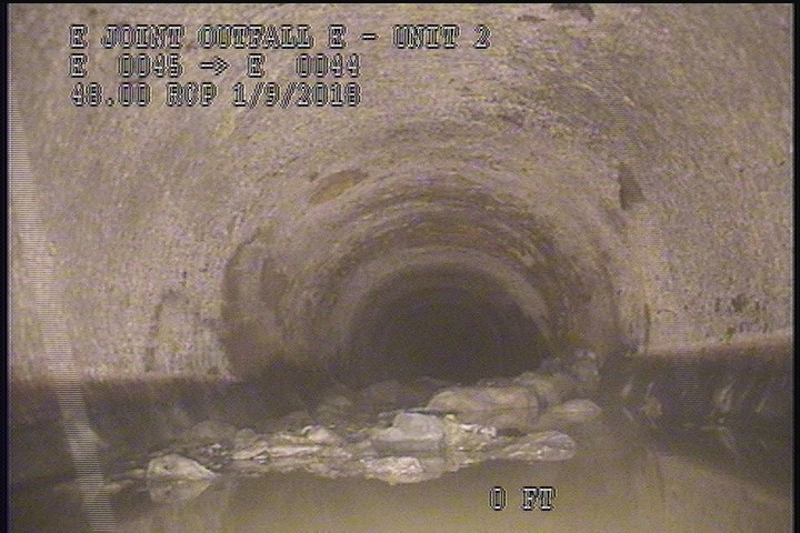 Deposits Settled Other, 30 %of cross sectional area, from 04 to 08 o'clock, , within 8 inches of joint: YES - SLUDGE