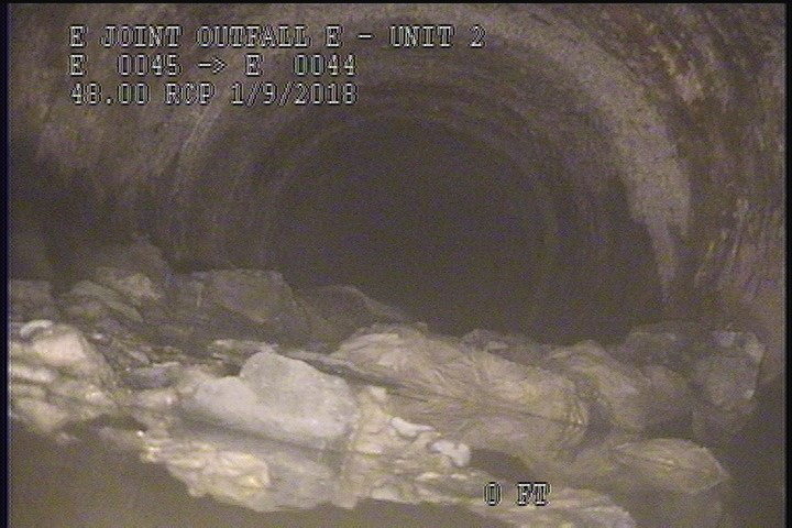 Deposits Settled Other, 30 %of cross sectional area, from 04 to 08 o'clock, , within 8 inches of joint: YES - SLUDGE