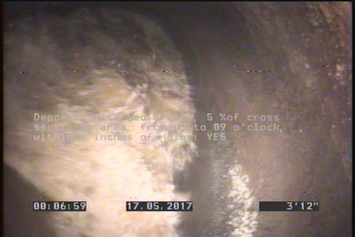 Deposits Attached Grease, 5 %of cross sectional area, from 03 to 09 o'clock, , within 8 inches of joint: YES