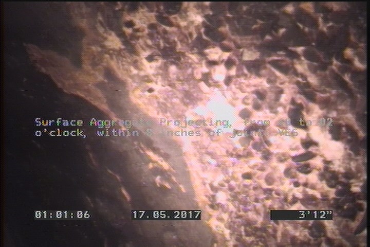 Surface Aggregate Projecting, from 10 to 02 o'clock, within 8 inches of joint: YES