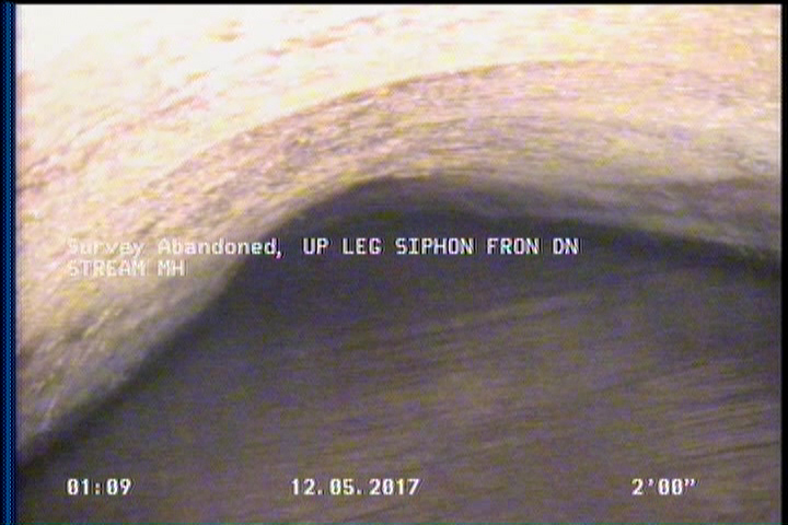 Survey Abandoned - UP LEG SIPHON FRON DN STREAM MH