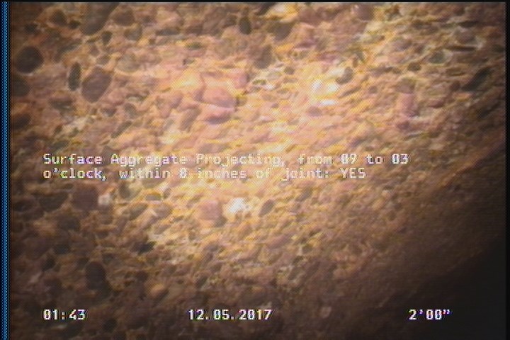 Surface Aggregate Projecting, from 09 to 03 o'clock, within 8 inches of joint: YES