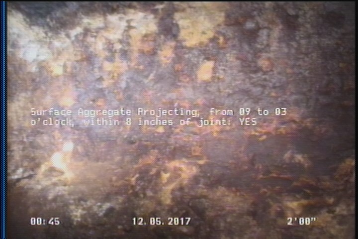 Surface Aggregate Projecting, from 09 to 03 o'clock, within 8 inches of joint: YES