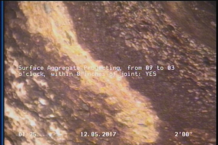 Surface Aggregate Projecting, from 09 to 03 o'clock, within 8 inches of joint: YES