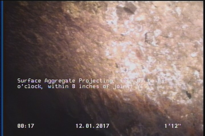 Surface Aggregate Projecting, from 09 to 03 o'clock, within 8 inches of joint: YES