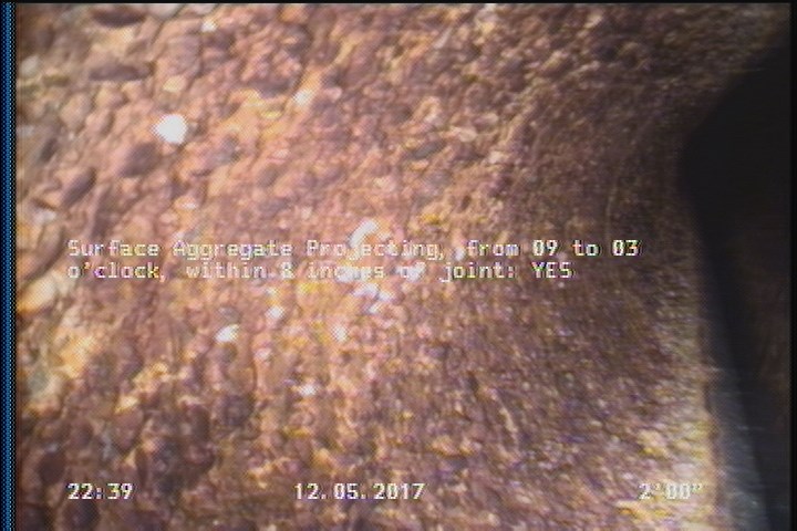 Surface Aggregate Projecting, from 09 to 03 o'clock, within 8 inches of joint: YES
