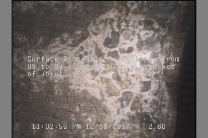 Surface Aggregate Projecting, from 09 to 03 o'clock, within 8 inches of joint: YES