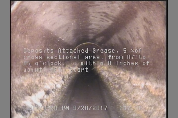 Deposits Attached Grease, 15 %of cross sectional area, from 07 to 05 o'clock, , within 8 inches of joint: YES, Start