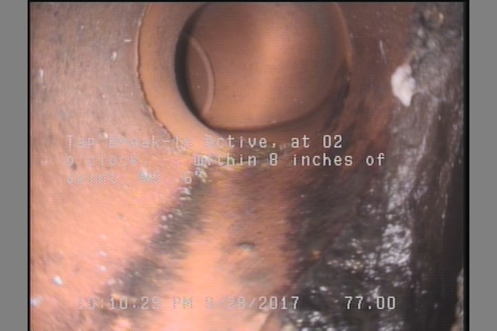 Tap Break-In Active, at 02 o'clock, -, within 8 inches of joint: NO, 6"