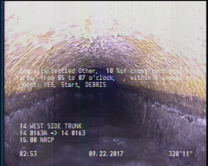 Deposits Settled Other, 10 %of cross sectional area, from 05 to 07 o'clock, , within 8 inches of joint: YES, Start - DEBRIS