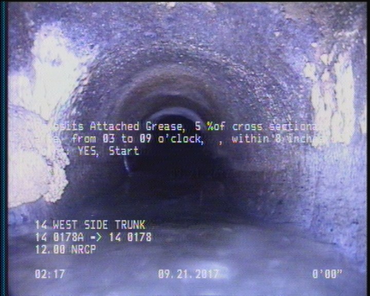 Deposits Attached Grease, 5 %of cross sectional area, from 03 to 09 o'clock, , within 8 inches of joint: YES, Start