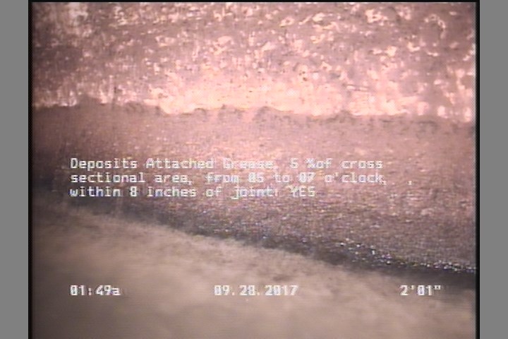 Deposits Attached Grease, 5 %of cross sectional area, from 05 to 07 o'clock, , within 8 inches of joint: YES, Start