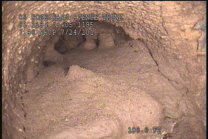 Tap Factory Made Defective, at 09 o'clock, -, within 8 inches of joint: YES, 4" - 95% GREASE/LATERAL
