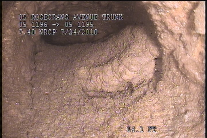 Tap Factory Made Defective, at 03 o'clock, -, within 8 inches of joint: YES, 4" - 60% GREASE/LATERAL