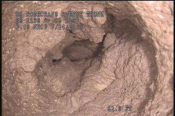 Tap Factory Made Defective, at 03 o'clock, -, within 8 inches of joint: YES, 4" - Open/60% GREASE/LATERAL