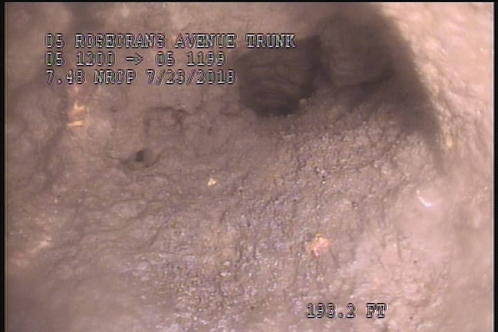 Tap Factory Made Defective, at 03 o'clock, -, within 8 inches of joint: YES, 4" - Open/65% GREASE/LATERAL