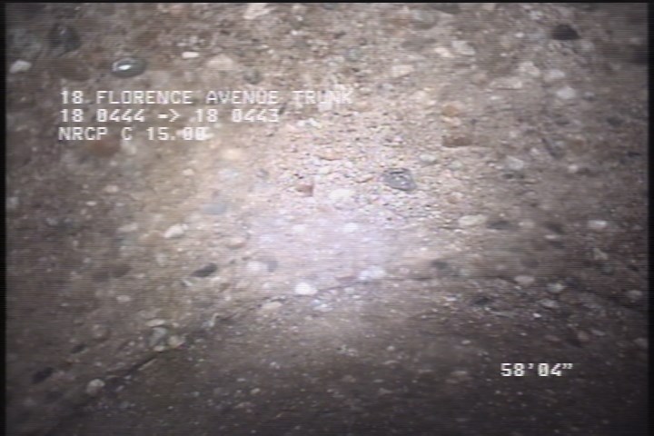 Surface Aggregate Projecting, from 09 to 03 o'clock, within 8 inches of joint: YES - SEVERE AGG